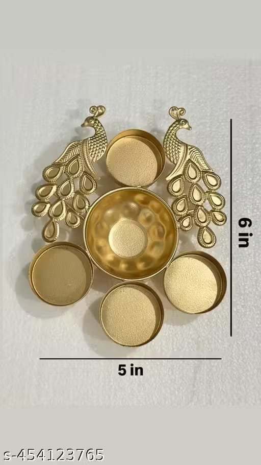IMG-20250930-WA0053.jpg Peacock 4-Diya Urli – Decorative Metal Urli Bowl with Diyas | Festive & Home Décor
